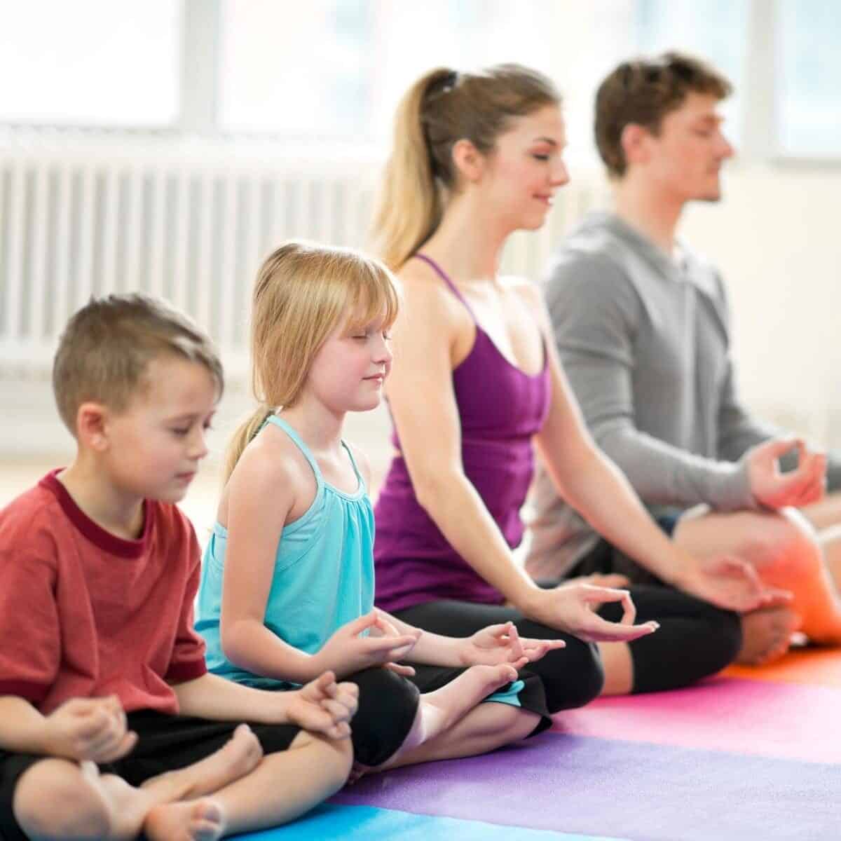 family doing yoga