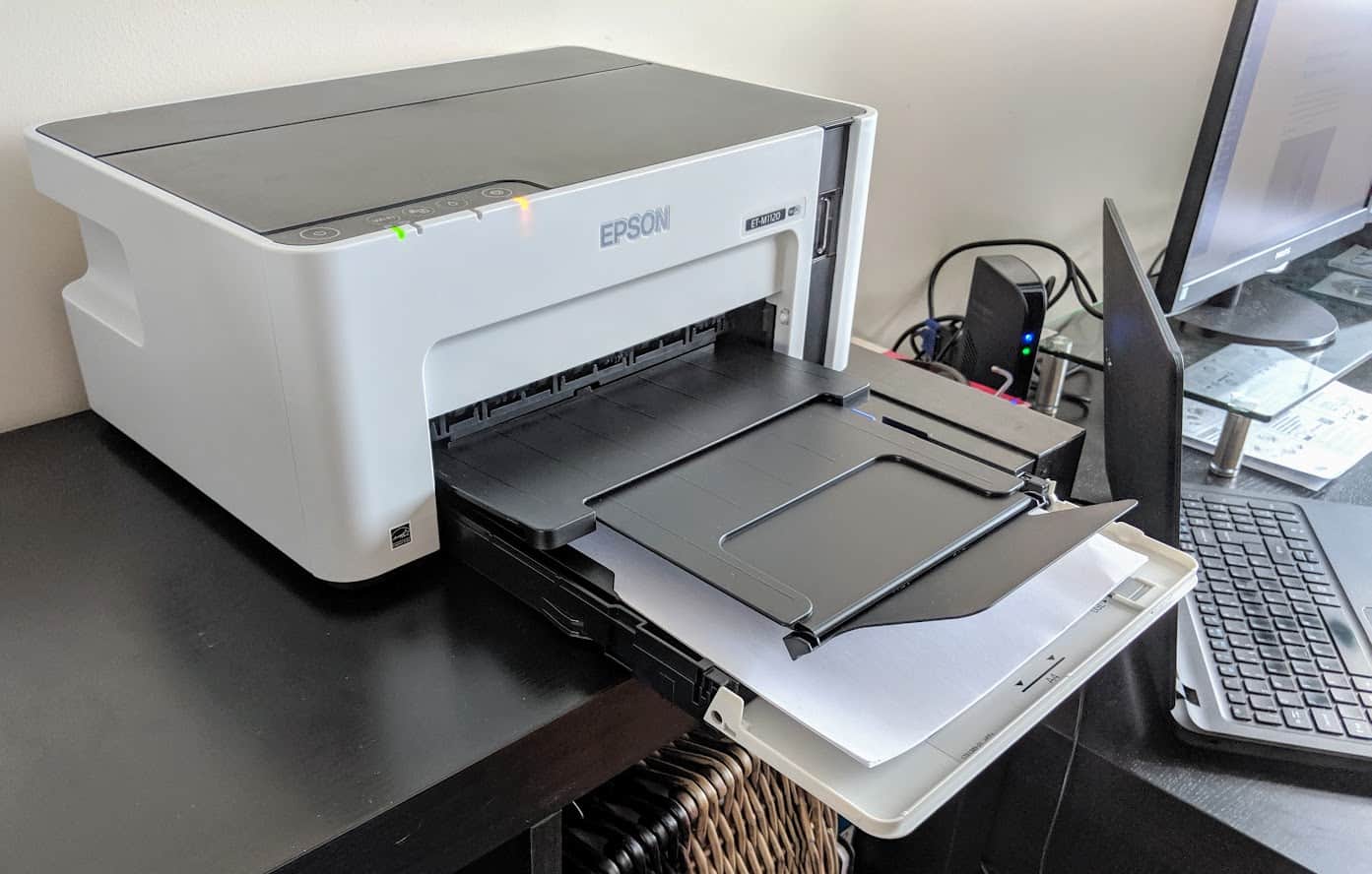 epson eco tank printer in process of set up with paper tray extended
