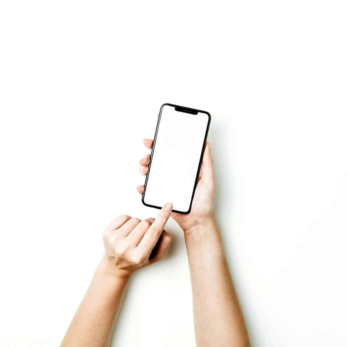 hands holding a mobile phone