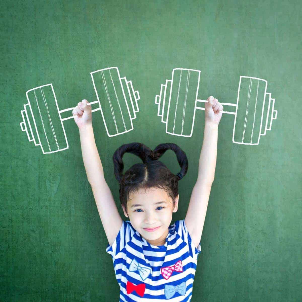 child pretending to weight lift