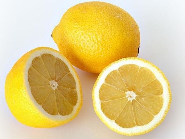 Lemon whole and a lemon cut up to juice to help with constipation