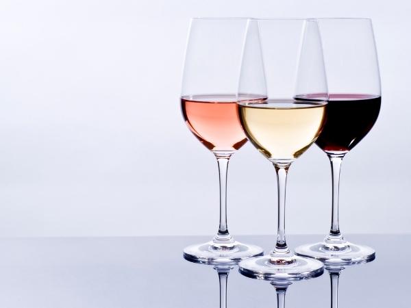 three glasses of wine, one red, one white and one rose. A small amount as shown is 5 syns or less