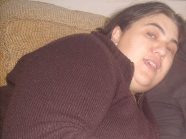 Jen very overweight with fat chin and brown jumper