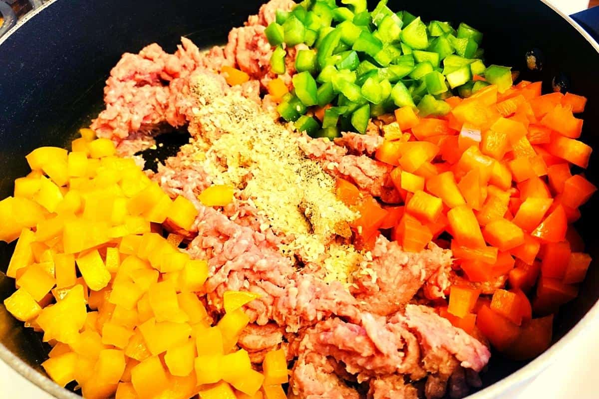 Beef and rice bowl veggies in the pan
