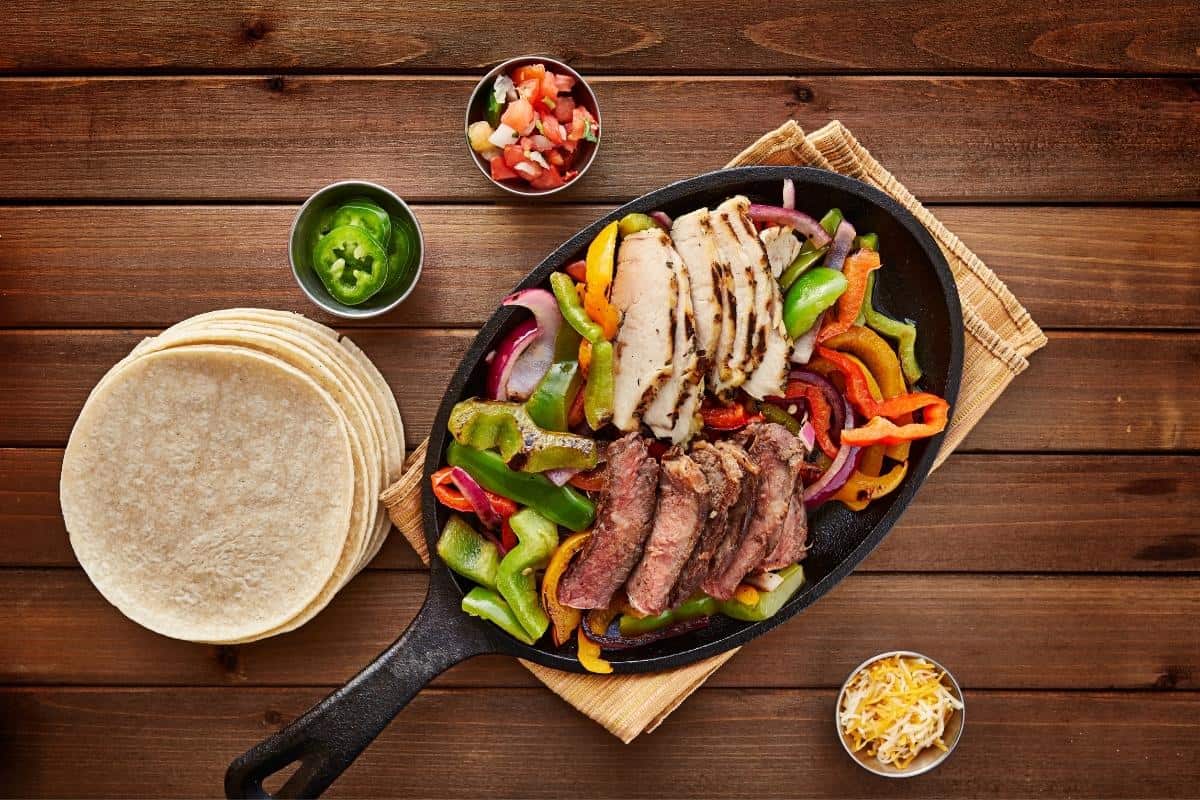 fajitas served on a skillet