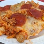 Pizza pasta bake in a white bowl