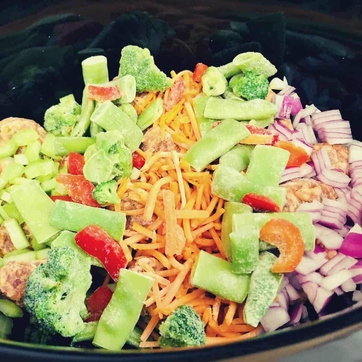 slow cooker full of vegetables