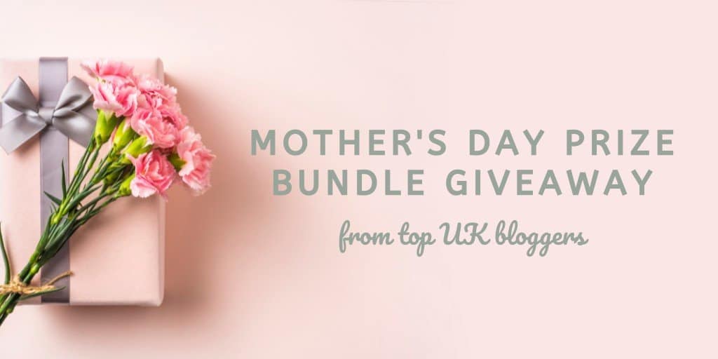 flowers on a gift with a pink background stating mother's day prize bundle giveaway from top uk bloggers