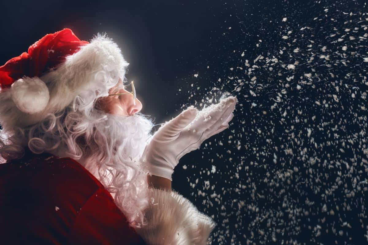 Santa blowing a wish