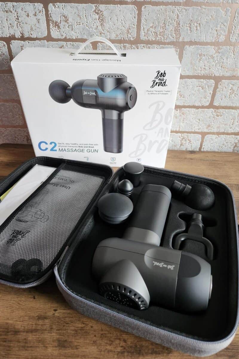 A massager in travel case including charger and different adapters for the end.