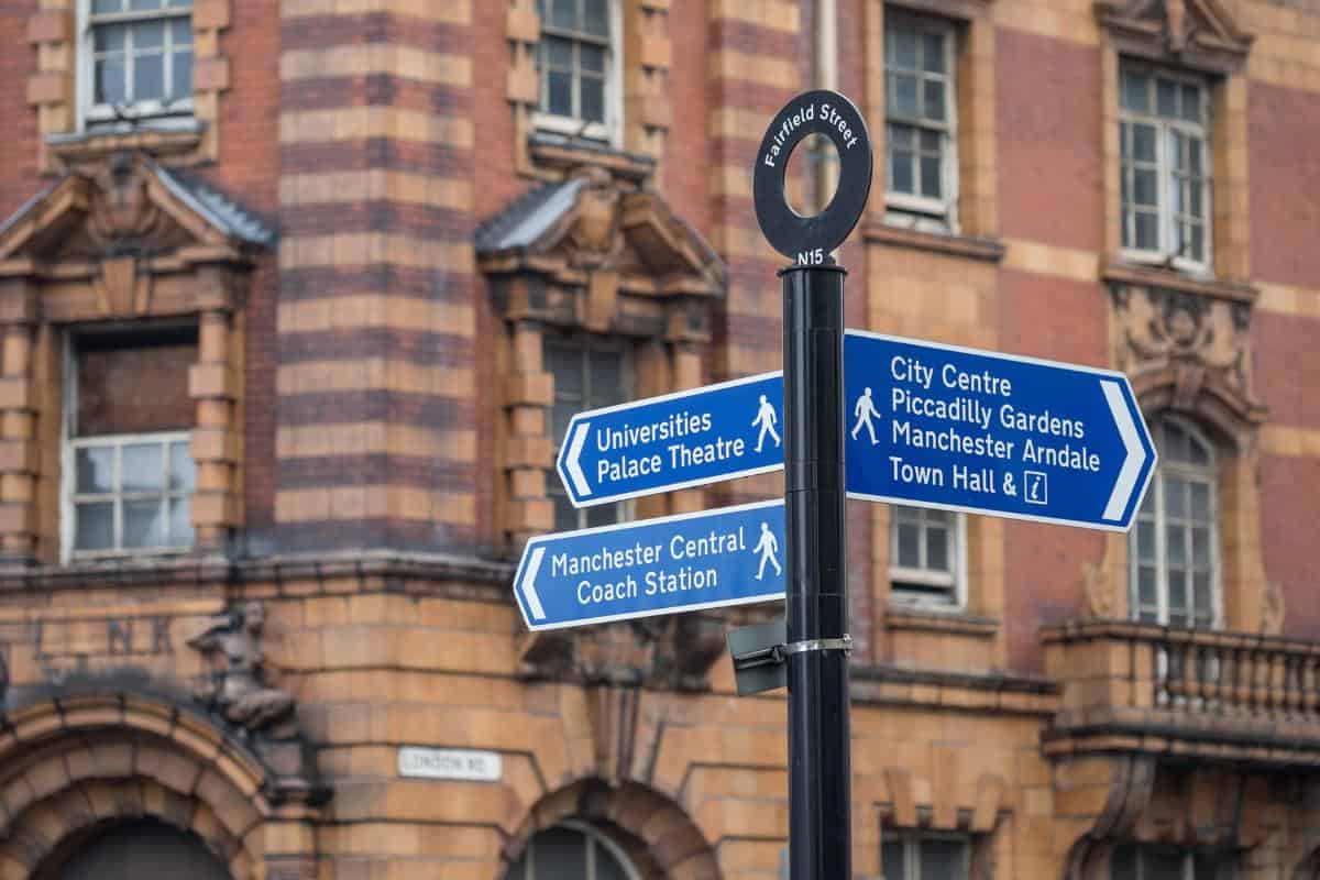 street sign in Manchester that you would see if you visit Manchester in autumn.