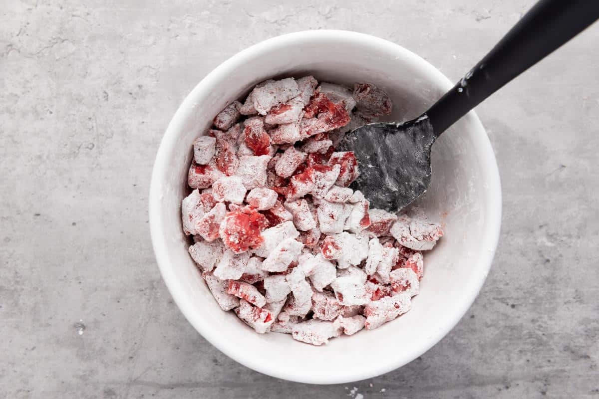 Bowl of beef coated in corn flour.