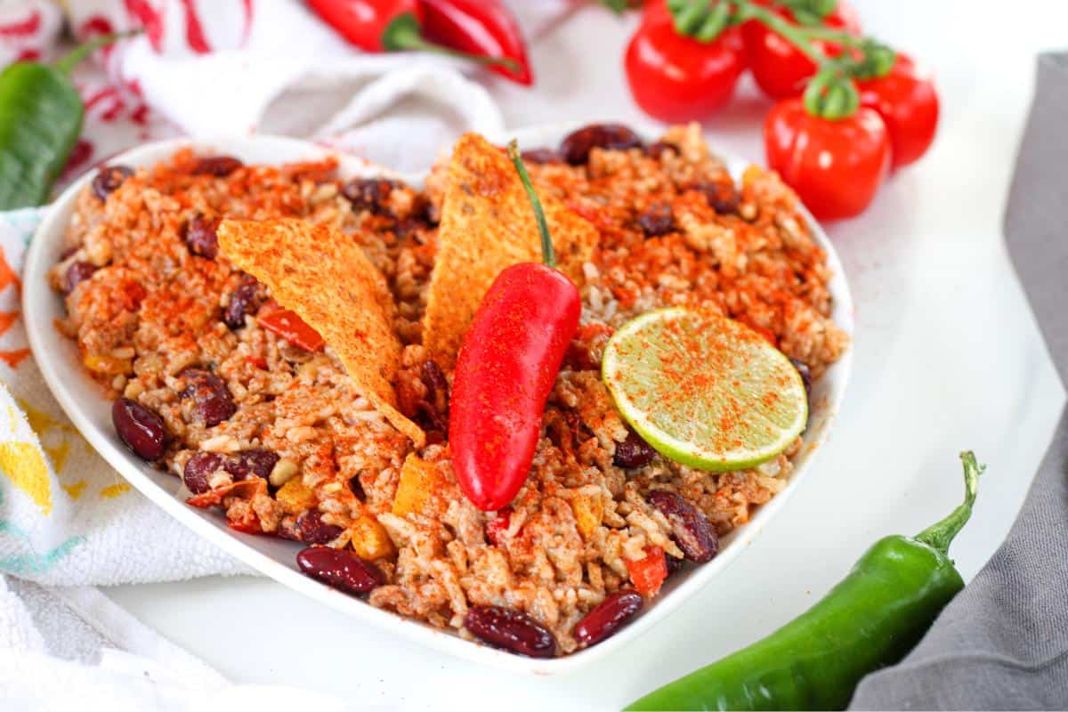 heart shaped bowl of vegan chilli con carne.
