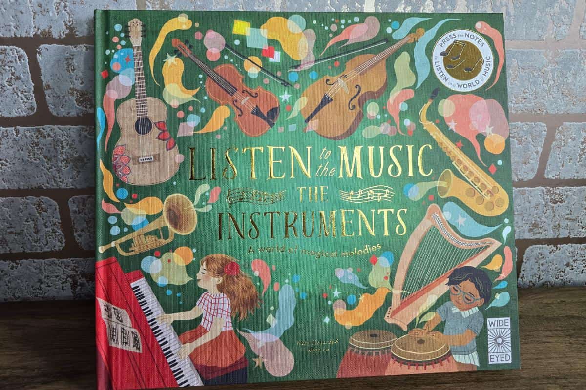 Listen to the Music: The Instruments" is a delightful children's book featuring colorful illustrations of musical instruments and two curious children, all set against a vibrant brick wall. It's a perfect addition to books for children, sparking curiosity and joy with every page.