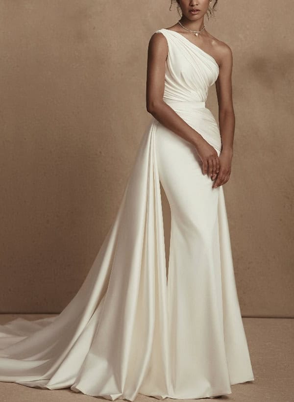 The perfect dress for a wedding, white fitted in all the right places and perfect for the woman's body shape.