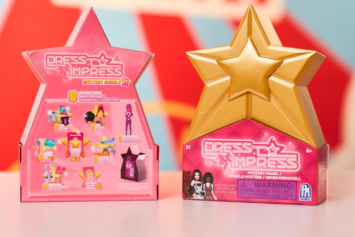 Two star-shaped boxes labeled "Dress to Impress Mystery Model" are displayed; perfect for Kids and sure to be on every Christmas List, one shows the gold star lid, the other shows toy images and instructions on a pink background.