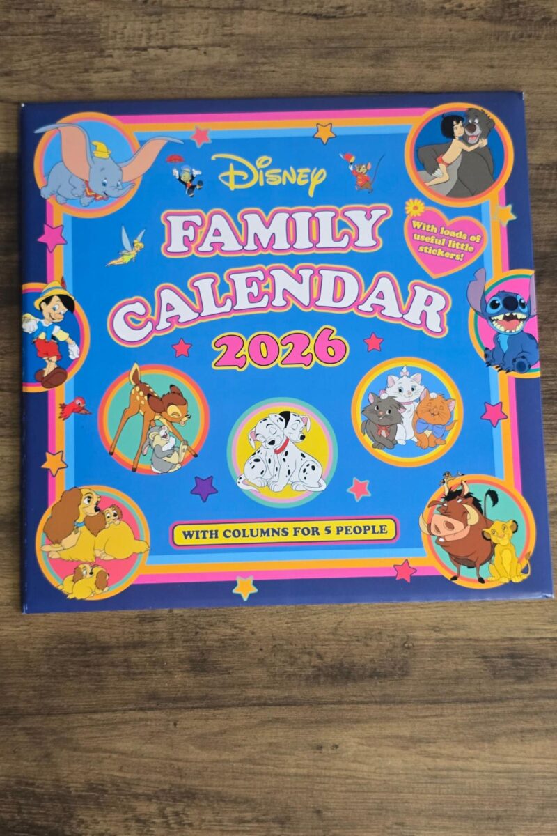 A 2026 Disney Family Calendar with a blue cover featuring colorful circles of classic Disney characters. With columns for 5 people, it’s a charming pick for Christmas Gifts and perfect for any Gifts for Families list.