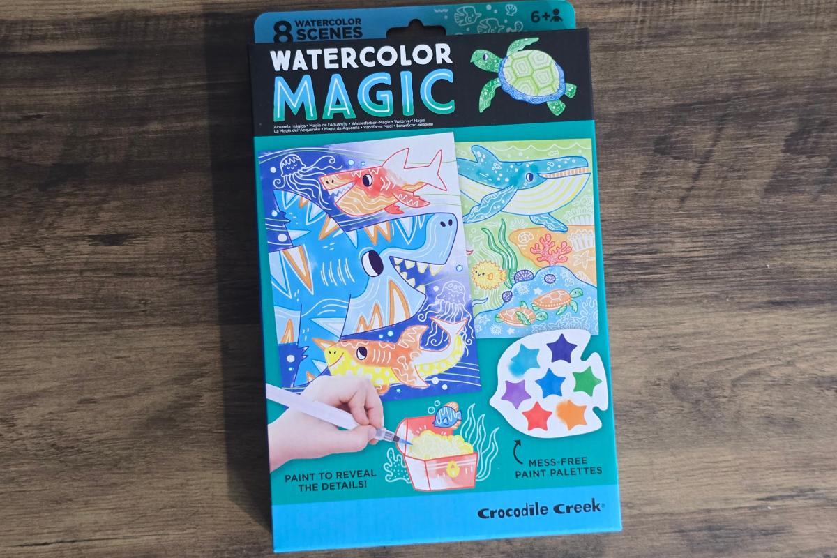 A box of Crocodile Creek Watercolor Magic, featuring ocean animal scenes and paint palettes. With its vibrant packaging, it's a perfect pick for children's Christmas gifts or any children's gift guide.