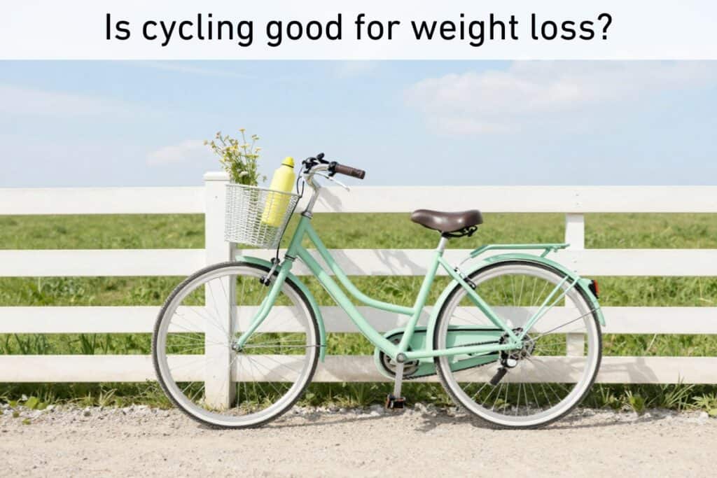 A mint green bicycle with a basket of flowers and a yellow bottle leans against a white fence under clear skies—a perfect scene for enjoying some outdoor exercise. The text above reads, "is cycling good for weight loss?.