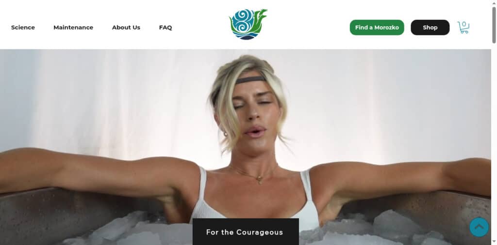 A person with blonde hair sits in an ice bath with arms outstretched, eyes closed, and appears calm. The website header includes navigation links and buttons for shopping and finding a location.